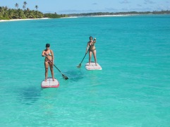 Floating on Direction Island on SUP
